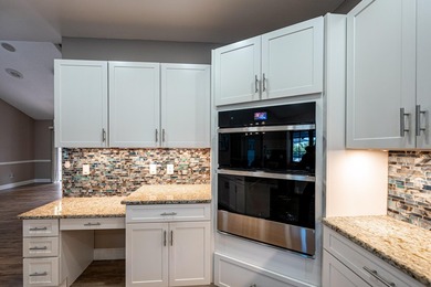 Come experience this impressive 6-bedroom, 5-bath residence with - photo 6