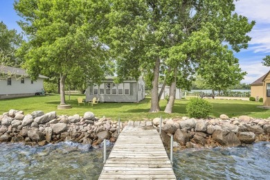 Summer Cottage... Beautiful lot with 56 feet of shoreline and an - photo 1