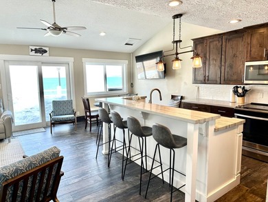 Rare opportunity to own an incredible beachfront townhome on the - photo 3