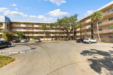 Bright 3/2 corner condo offering golf course living in Inverrary - photo 3