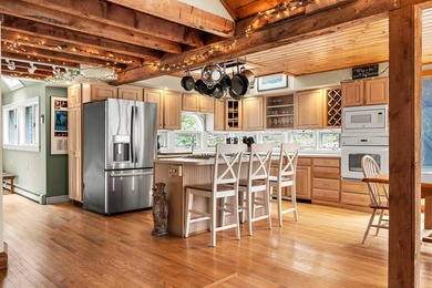 'The Arrowsic Lodge' Discover a residence that feels less like a - photo 5