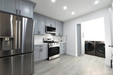 This colonial home has been extensively renovated and features a - photo 8