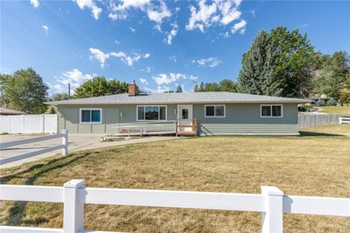 This spacious ranch-style home offering 7 bedrooms, 3.5 - photo 1