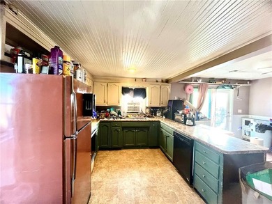 This property is a hunter and mechanic's dream. Eight acres of