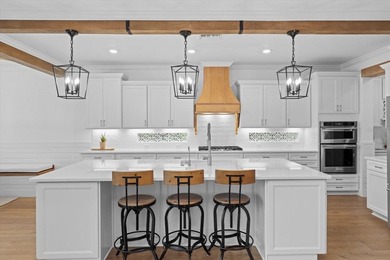 A masterclass in luxury living, this extensively customized - photo 15