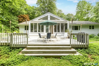 Introducing an exceptional ranch-style retreat nestled on a - photo 16