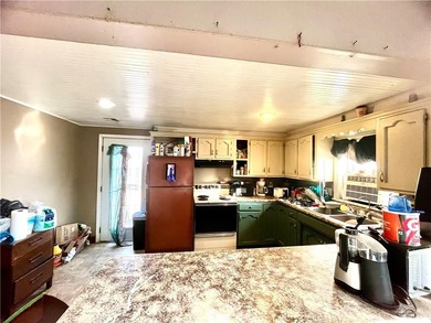 This property is a hunter and mechanic's dream. Eight acres of