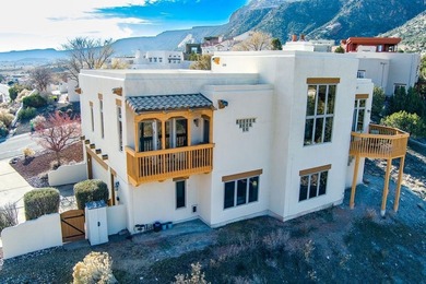This stunning 2,700 square foot southwest adobe-style residence