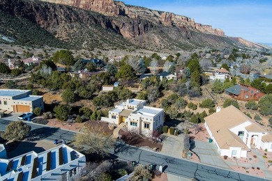 This stunning 2,700 square foot southwest adobe-style residence