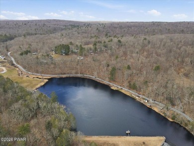 Set on 395 expansive acres, this rare offering features a fully - photo 2
