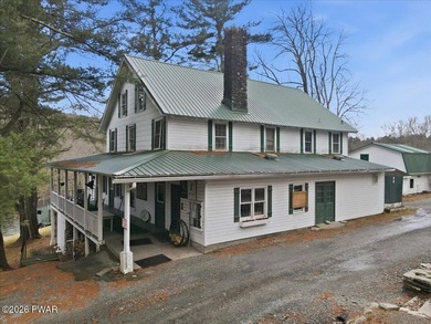 Set on 395 expansive acres, this rare offering features a fully - photo 4