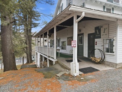 Set on 395 expansive acres, this rare offering features a fully - photo 5