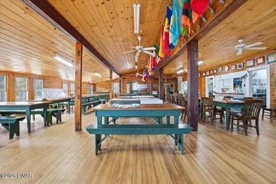 Set on 395 expansive acres, this rare offering features a fully - photo 8