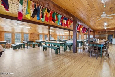 Set on 395 expansive acres, this rare offering features a fully - photo 9