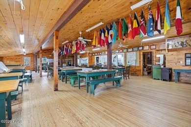 Set on 395 expansive acres, this rare offering features a fully - photo 10