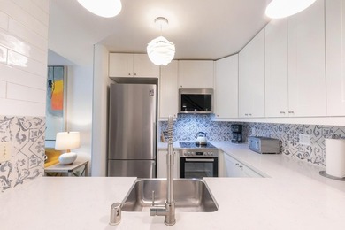 This beautifully updated 2-bedroom, 1.5-bath townhouse with a - photo 4
