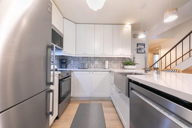 This beautifully updated 2-bedroom, 1.5-bath townhouse with a - photo 8