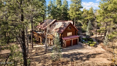 Incredibly rare full log home on the 15th fairway of the - photo 2