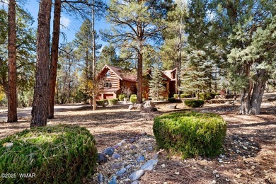 Incredibly rare full log home on the 15th fairway of the - photo 3