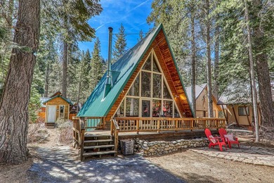 Welcome to 15685 Pine Street, a charming vintage A-frame nestled - photo 1