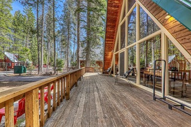 Welcome to 15685 Pine Street, a charming vintage A-frame nestled - photo 3
