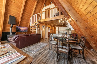 Welcome to 15685 Pine Street, a charming vintage A-frame nestled - photo 6