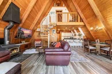 Welcome to 15685 Pine Street, a charming vintage A-frame nestled - photo 8