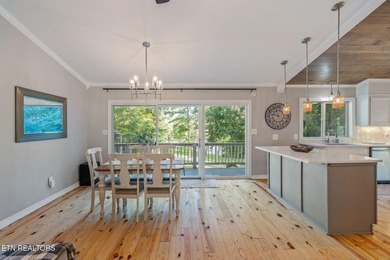 This stunning 4-bedroom, 4-bath tri-level home sits on one of - photo 12