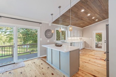 This stunning 4-bedroom, 4-bath tri-level home sits on one of - photo 13