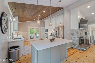 This stunning 4-bedroom, 4-bath tri-level home sits on one of - photo 14