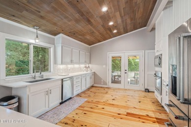 This stunning 4-bedroom, 4-bath tri-level home sits on one of - photo 15