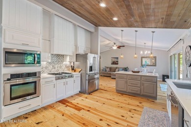 This stunning 4-bedroom, 4-bath tri-level home sits on one of - photo 18