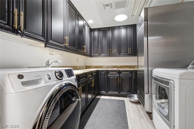 Privately gated custom estate with NO HOA on over half an acre