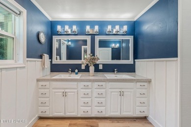 This stunning 4-bedroom, 4-bath tri-level home sits on one of - photo 22