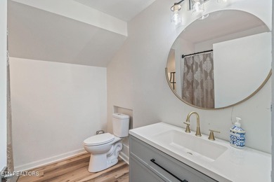 This stunning 4-bedroom, 4-bath tri-level home sits on one of - photo 36