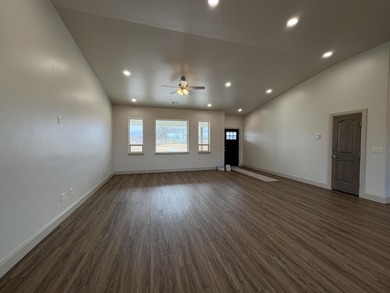 *Ruby Model* with no steps access is situated across from the