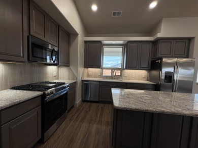 *Ruby Model* with no steps access is situated across from the