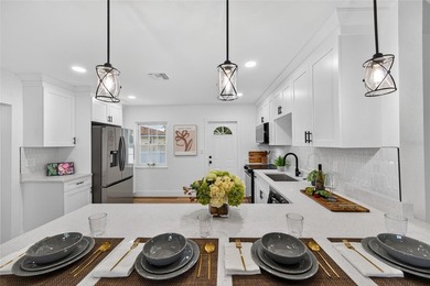 Welcome to this stunning, fully remodeled 3-bedroom, 2-bathroom - photo 12