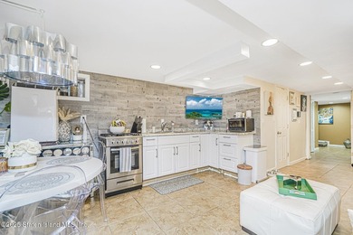 Beautiful raised ranch on large 40 x 107 lot. Level 1: Living - photo 22