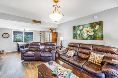 Conveniently located within walking distance to the beach this 2 - photo 2