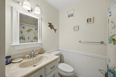 Enjoy coastal living in this beautiful fully furnished 2-bedroom - photo 11