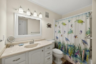 Enjoy coastal living in this beautiful fully furnished 2-bedroom - photo 12