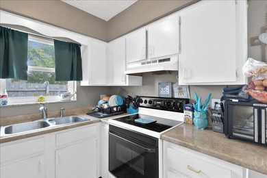 This beautiful CBS home features a 2021 metal roof, spacious - photo 24