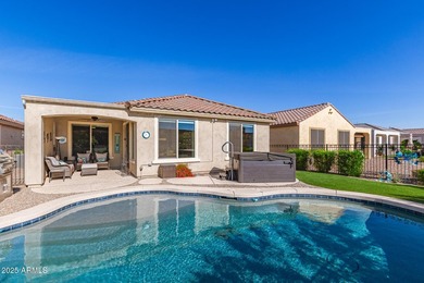 Resort-style 55+ living in Sun City Festival! This upgraded