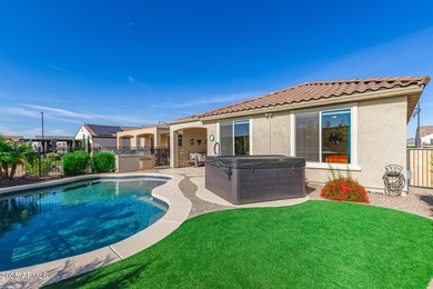 Resort-style 55+ living in Sun City Festival! This upgraded