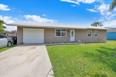 This beautiful CBS home features a 2021 metal roof, spacious - photo 47