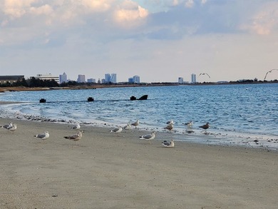 Experience breathtaking coastal living in this 4-bedroom, 3