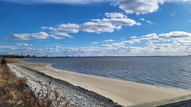 Experience breathtaking coastal living in this 4-bedroom, 3