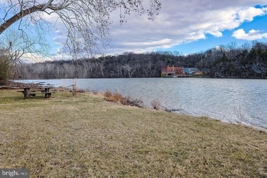Discover the possibilities on Riverbend Drive. Tucked within a - photo 18
