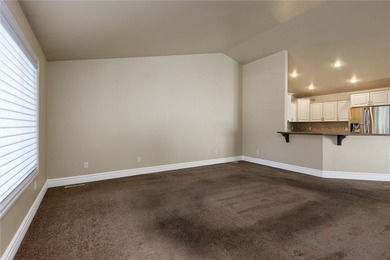 2,370 square foot 4 bedroom, 3 bath ranch style townhome. 2 car - photo 2